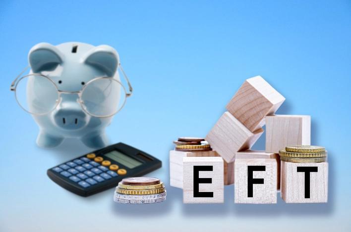 Blue piggy wearing glasses with a calculator